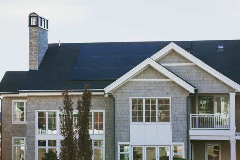 Shingled home with sleek black solar panels